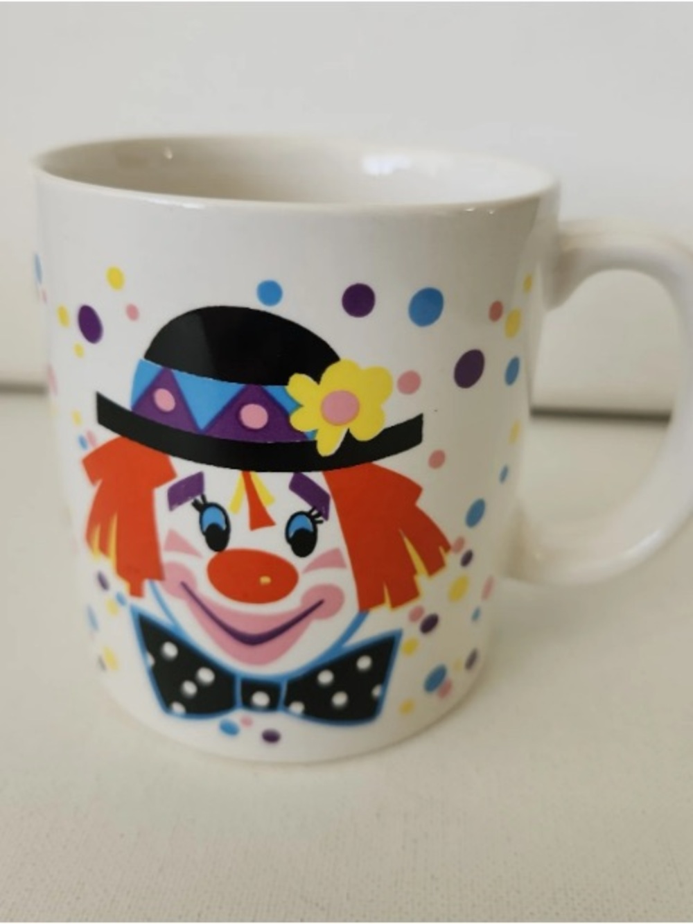 White Ceramic Clown Mug with Colorful Confetti Design